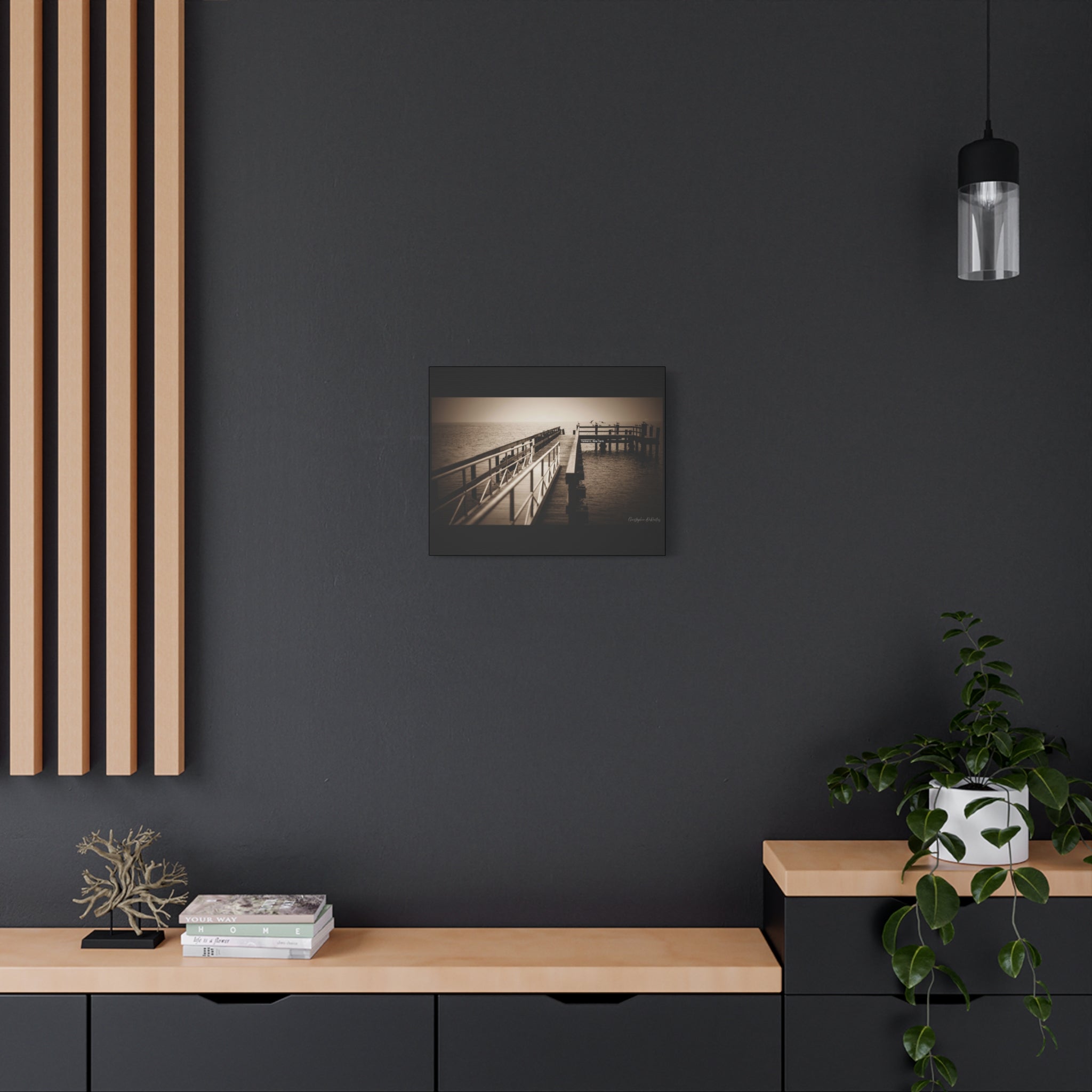 Tranquil dock leads toward a dramatic foggy horizon,  moody yet peaceful atmosphere.